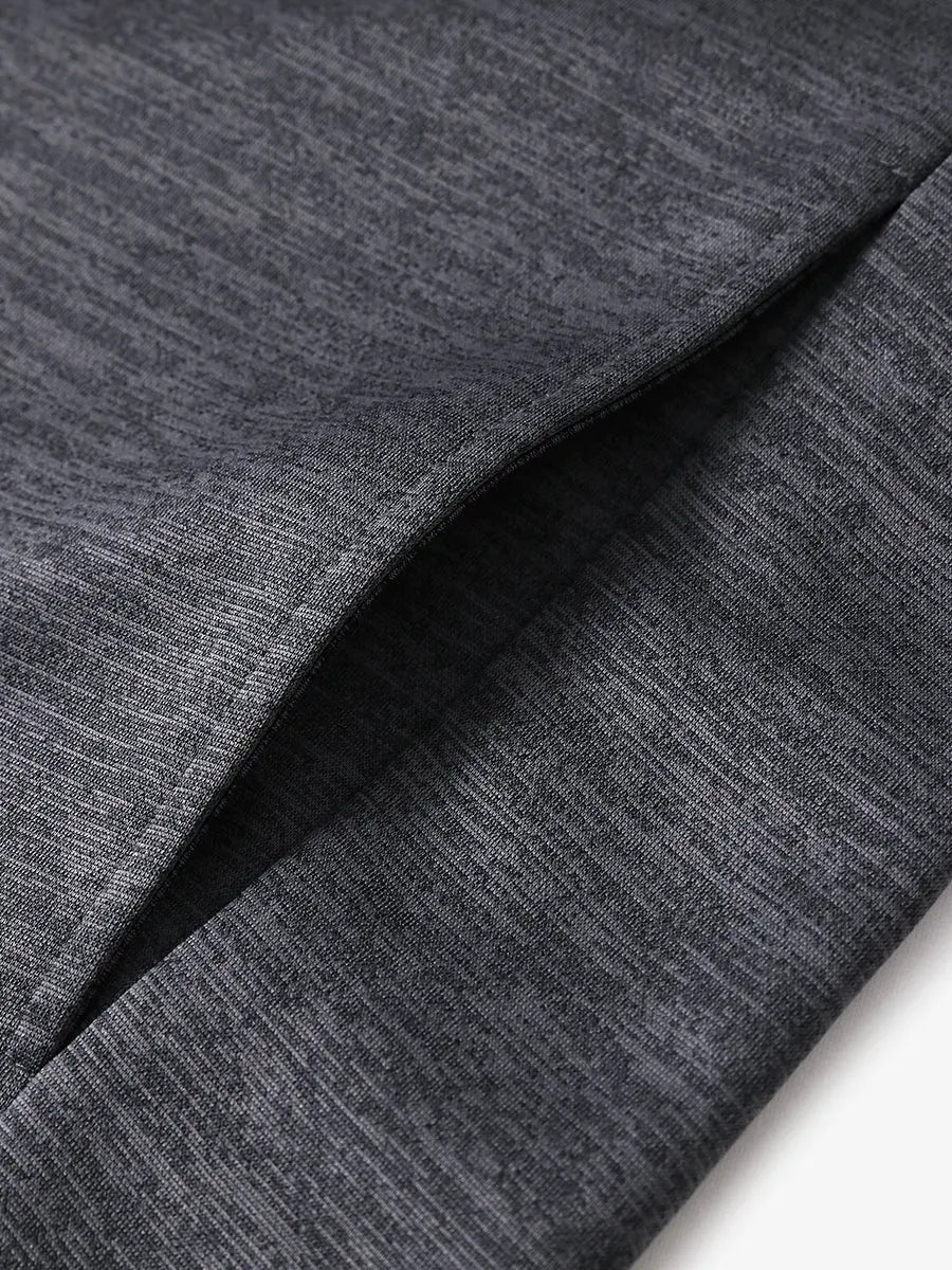 Close-up of right pocket showing stitching and cozy fabric on Neutral Grey Heather hoodie