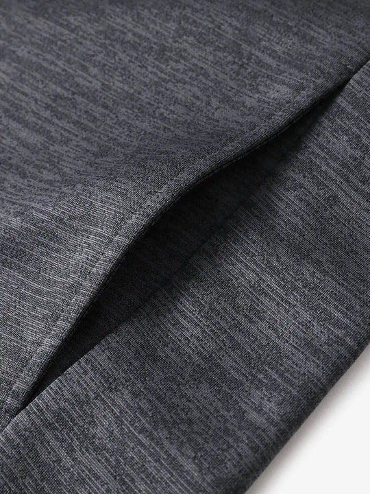Close-up of right pocket showing stitching and cozy fabric on Neutral Grey Heather hoodie