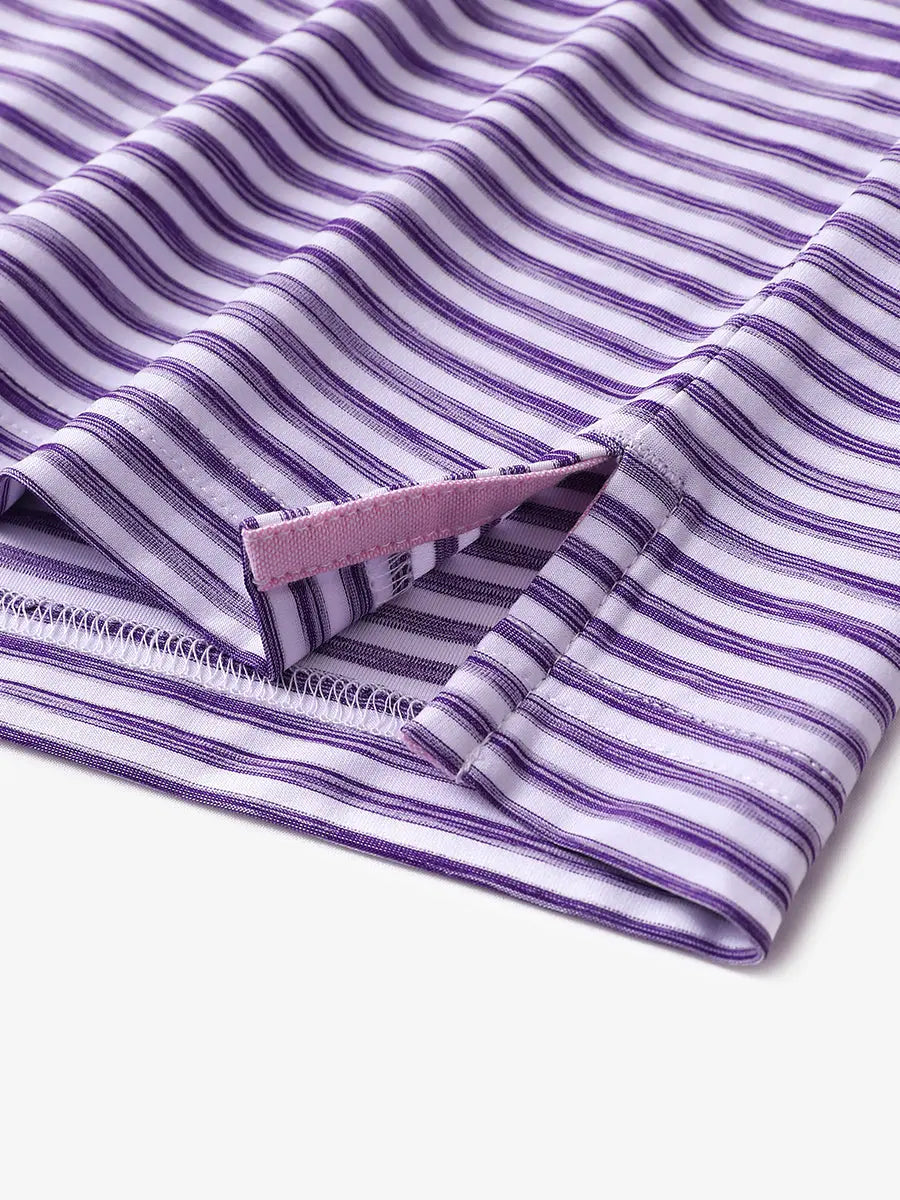 Hem slit detail on PURPLE WHITE polo, emphasizing the painterly stripe style and fine tailoring