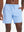Front lower-body view from waist to knees of model wearing LIGHT BLUE 2 in 1 Running Sports Shorts with Liner