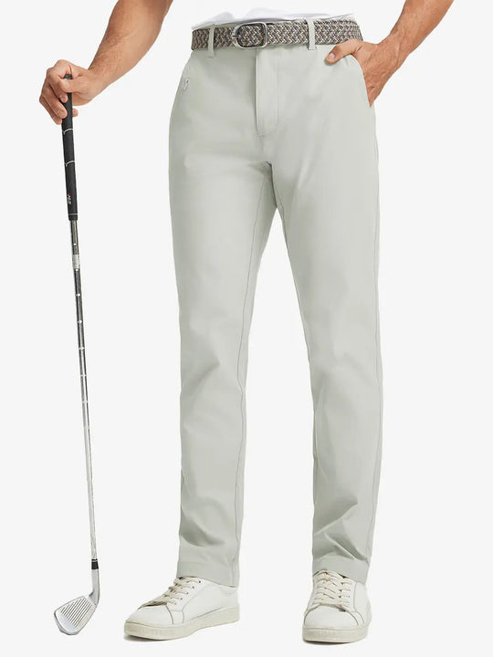 Front lower leg view of Water Repellent 8 Pockets Pants in SILVER GREY，showing fabric texture and fit.，model holds golf club with right hand.