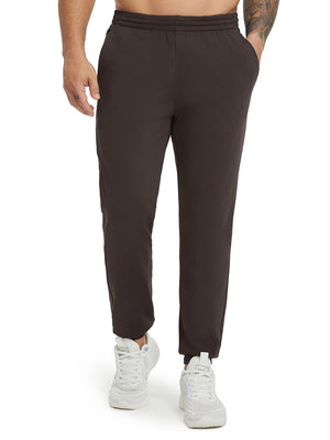 Model wearing Water Resistant Comfy Fleece Golf Joggers in coffee brown, lower body front view