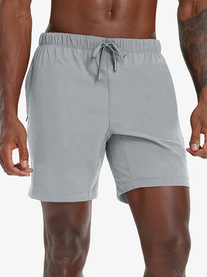 Front lower-body view from waist to knees of model wearing LIGHT GREY 2 in 1 Running Sports Shorts with Liner