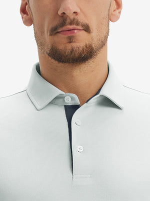 Front view from nose to chest of model wearing the silver gray ventilated pique performance polo, showcasing the upper fit