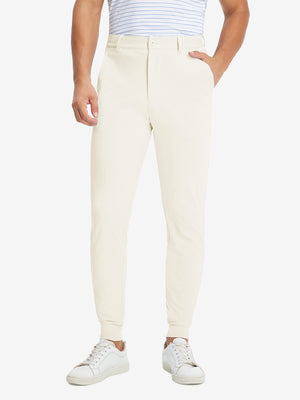 Model wearing Lightweight Ankle-Zip Sweatpants with 4 Pockets in cream, lower body front view