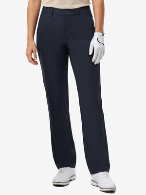 Front lower body shot of model wearing navy women's regular fit stretchy golf pants
