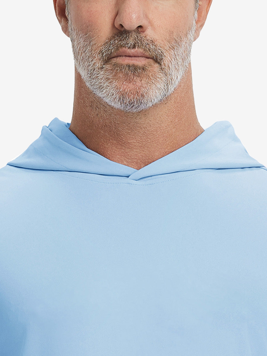 Close-up from nose to chest, showing soft collar texture and stitching detail of the light blue hoodie.