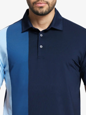 Front half-body view from nose to chest of model wearing NAVY Moisture Wicking Color Block Polo Shirt.