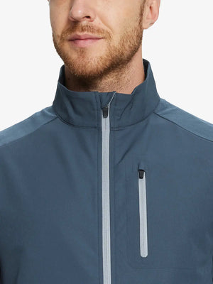 Model wearing the misty blue windproof golf vest, emphasizing its fresh design and zippered pockets.