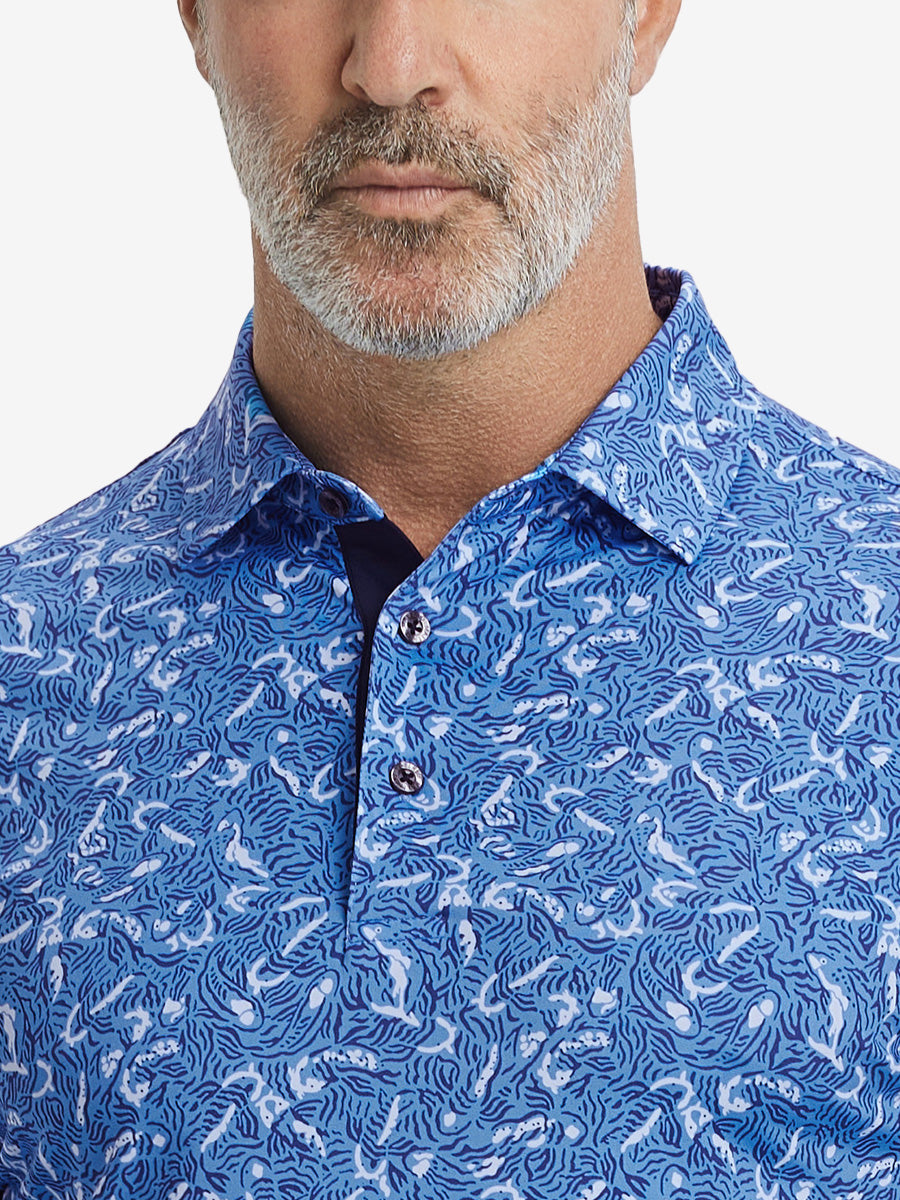 Close-up from nose to chest, showing collar and fabric pattern detail of the line animal polo shirt.