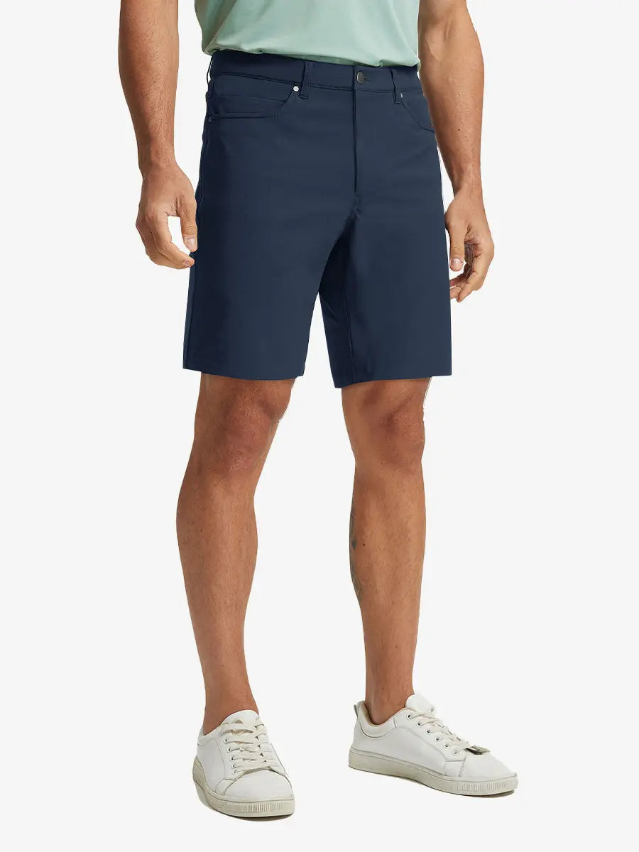 NAVY 4-way Stretch Performance Solid Shorts, golfer front lower body with club, 9 Inch view