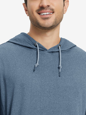 Close-up from nose to chest, showing soft heather texture and collar detail of the navy melange hoodie.