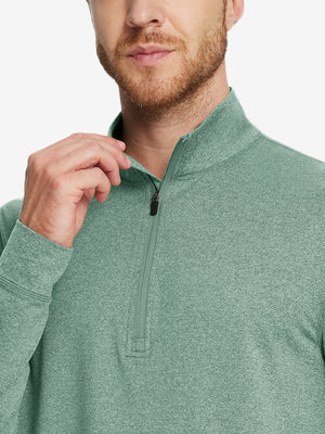 Model wearing quarter zip melange pullover, dark green melange, front upper-body with relaxed fit.