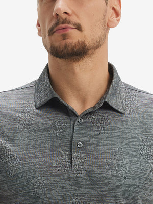 Front view from nose to chest of model wearing grey pineapple breathable jacquard pattern 3-button golf polo
