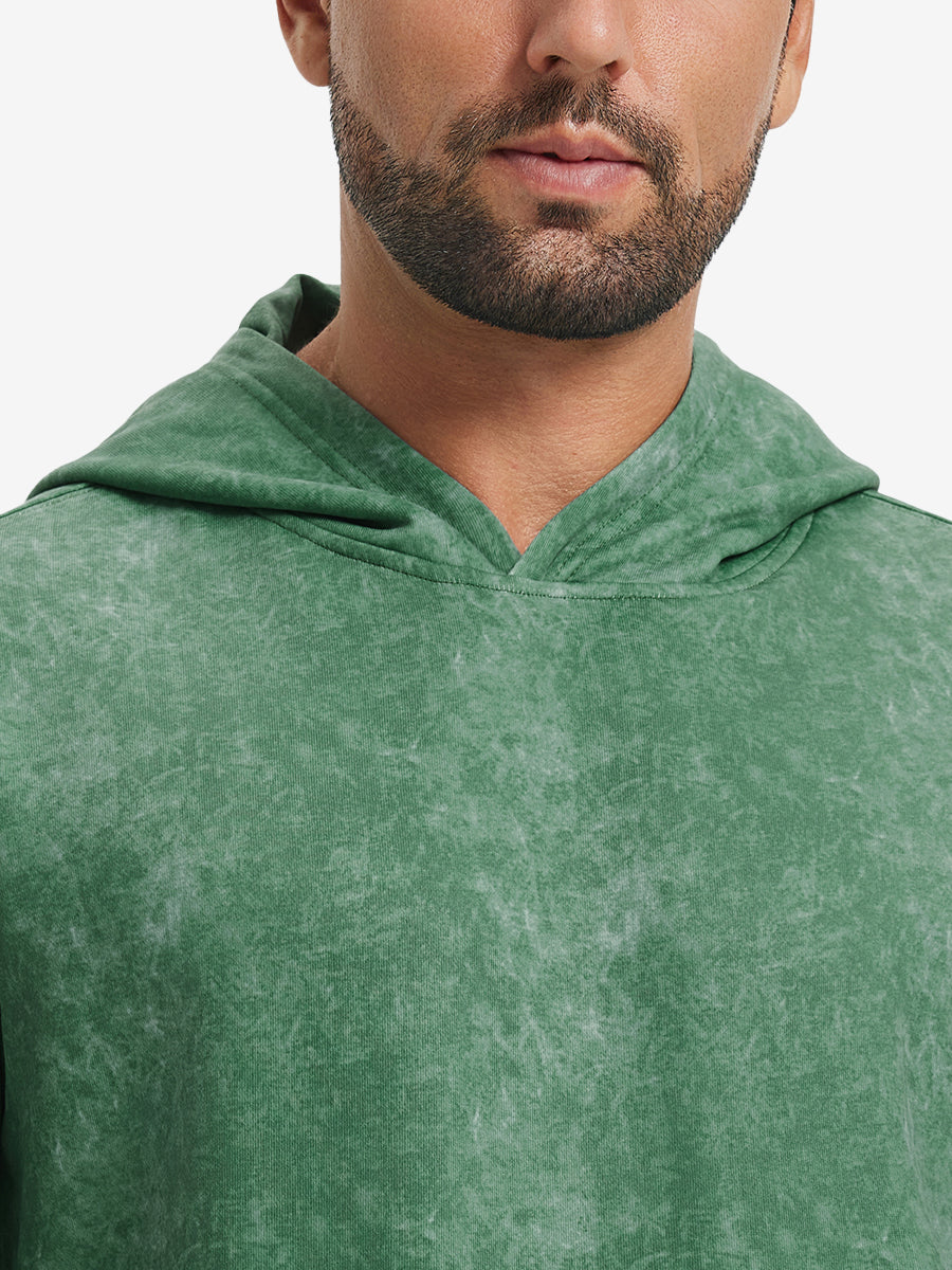 Close-up of neckline and drawstring area of the exclusive print kangaroo hoodies in green.