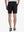 Back view of Player Fit Versatile Solid Shorts, showing tailored fit and clean lines – BLACK