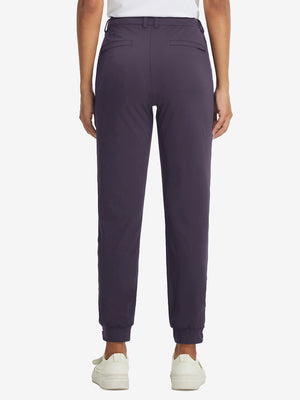 Back view of Women's Ultra-stretch Quick Dry Sweatpants with Ankle Zips in dark purple