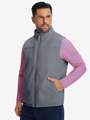 Model's front half-body shot with one hand in the pocket, wearing dark grey windproof fleece reversible golf vest.