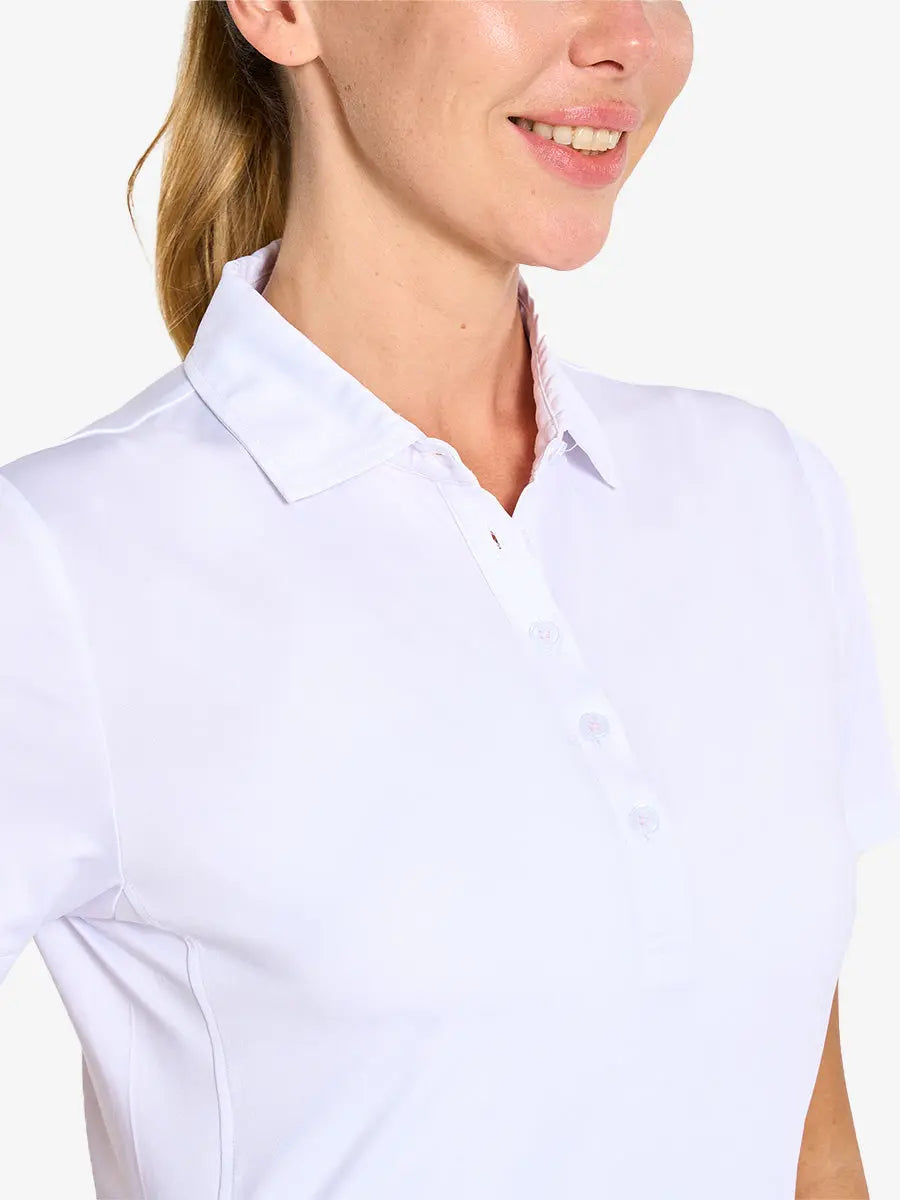 Close-up front view from nose to chest in WHITE Women's Performance Solid Polo