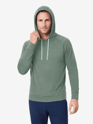 Model front upper body wearing view, heather midlayer golf hoodies in celadon green heather