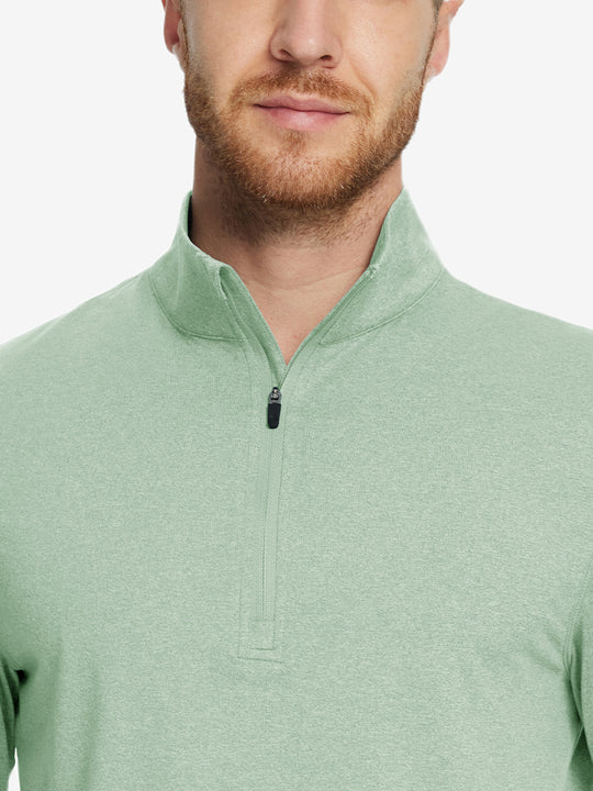 Model front half-body view pulling zipper slightly on quarter zip melange pullover beryl green melange.