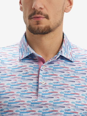 Front view from nose to chest of model wearing colorful graffiti performance quick dry print golf polos