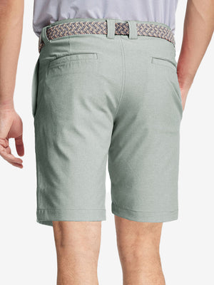 Back view of youth in glacier grey Heather Performance Golf Shorts, highlighting rear design and fit