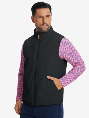 Model's front half-body shot with one hand in the pocket, wearing black windproof fleece reversible golf vest.