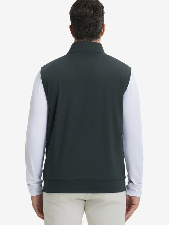 Back upper body view of the dark grey print collar quarter zip golf vest, clean cut and relaxed posture.
