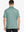Back half-body view of male model wearing the Beryl Green Everyday Classic Solid Polo