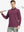 Model in BORDEAUX RED Long Sleeve Solid Jersey Polo holding golf club with confident front pose
