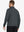 Full-body front view of model wearing DARK GREY HEATHER Quarter Zip Melange Pullover with backpack, sporty casual look.