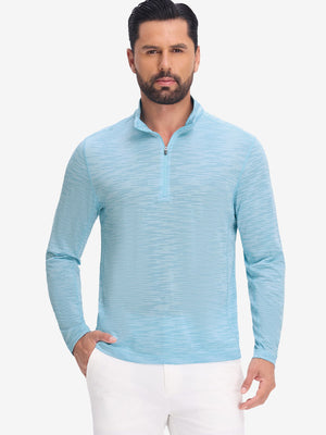 Front upper body shot of model wearing misty blue featherweight midlayer quarter zip pullover