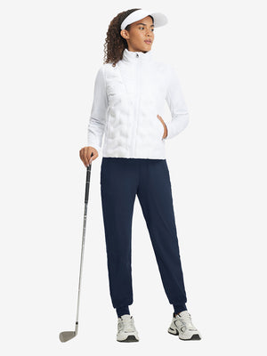 Full-body front view of model wearing women's stretch fleece lined water resistant joggers in navy.