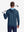 Model back upper body display shot, heather midlayer golf hoodies in dark blue heather