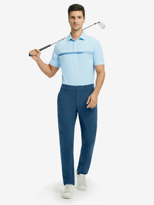 Full-body shot of model holding golf club, styled with quick dry casual dress pants in blue indigo.