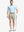 Model wearing Khaki shorts, right hand in pocket – 7 Inch inseam