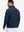 Back upper body view of Fleece lined golf quarter zip with smooth navy finish
