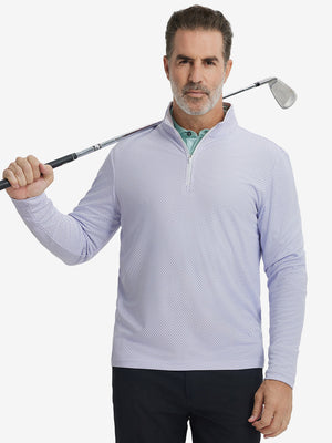 Model holding a golf club wearing jacquard quarter zip pullover in lavender, sporty and elegant look.