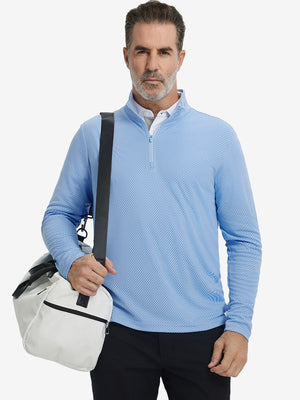 Model carrying a bag in jacquard quarter zip pullover in light blue, blending comfort and style.