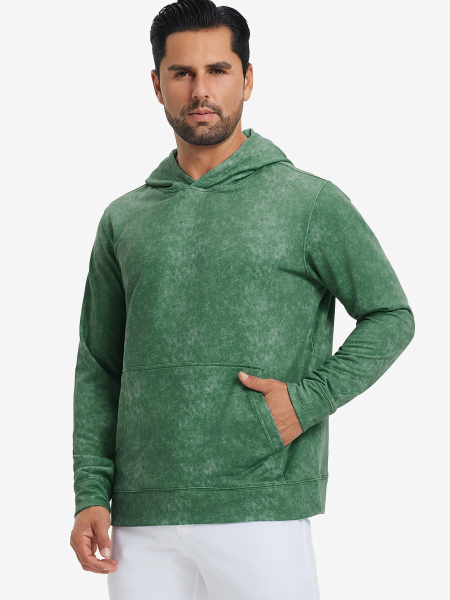 Model in green exclusive print kangaroo hoodies with hands in pocket, relaxed front upper view.