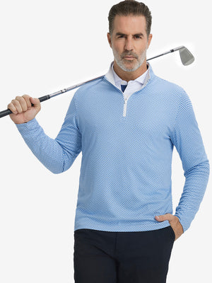 Model holding a golf club wearing jacquard quarter zip pullover in blue/white, sporty and elegant look.
