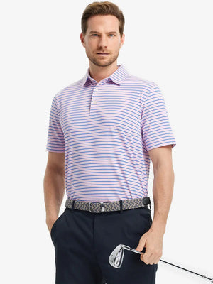 Model in LIGHT PINK/COBALT STRIPE Polo holding a golf club in a relaxed stance