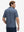 Back upper body view of model in Performance quick dry print golf polos with subtle blue white stars tone