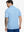 Back half-body view of model in BLUE HEATHER Premium Stretch Heather Polo.