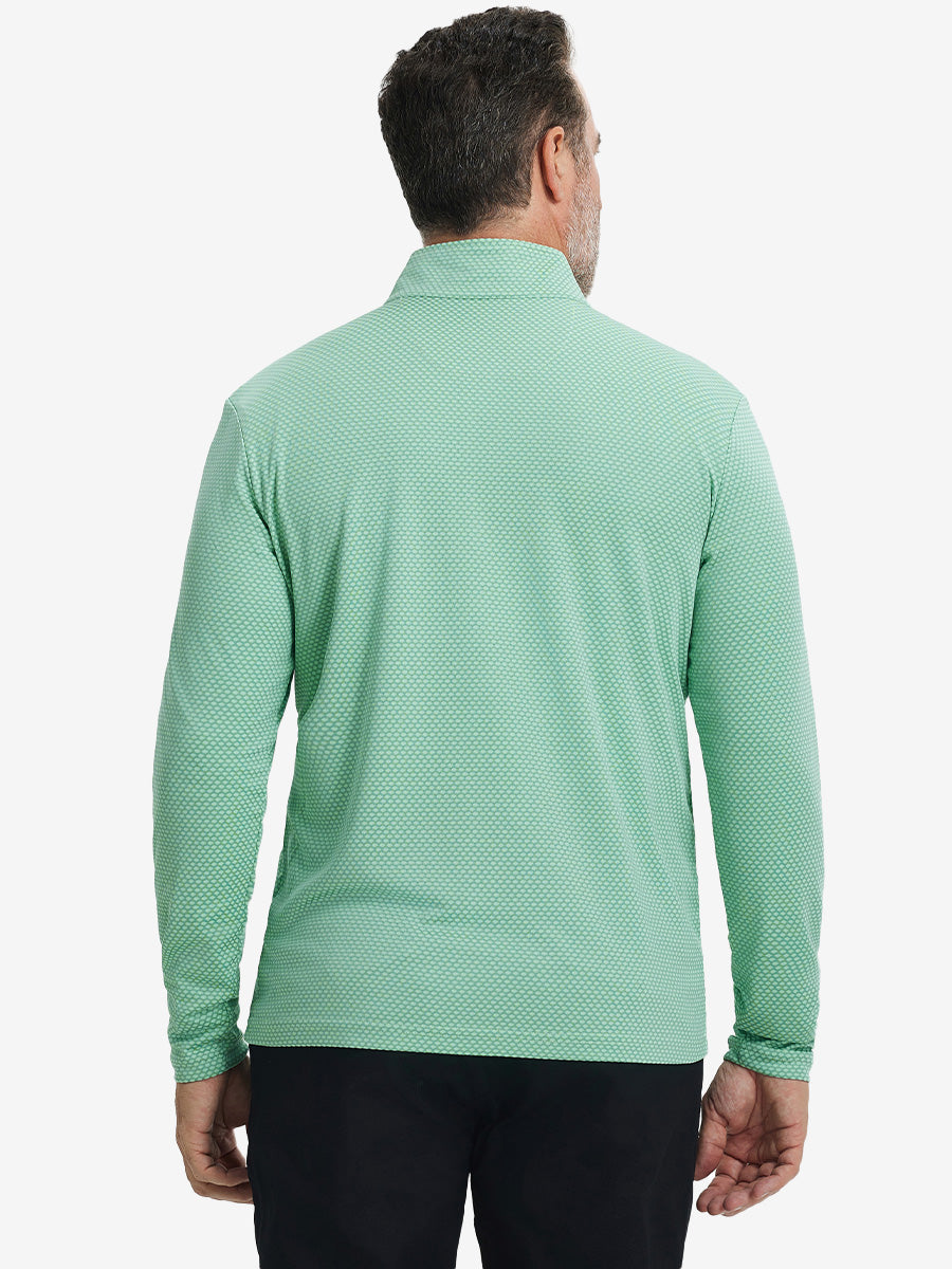 Back upper view of model wearing jacquard quarter zip pullover in light green, showing clean seam lines.