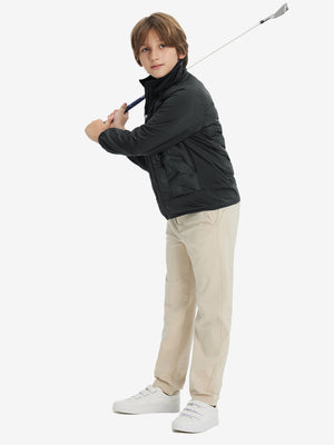 Model holding a racket, wearing black boys windproof puffer jacket with pockets in full-body view.
