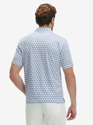 Back waist-up shot of model wearing white navy dolphin performance quick dry print golf polos.
