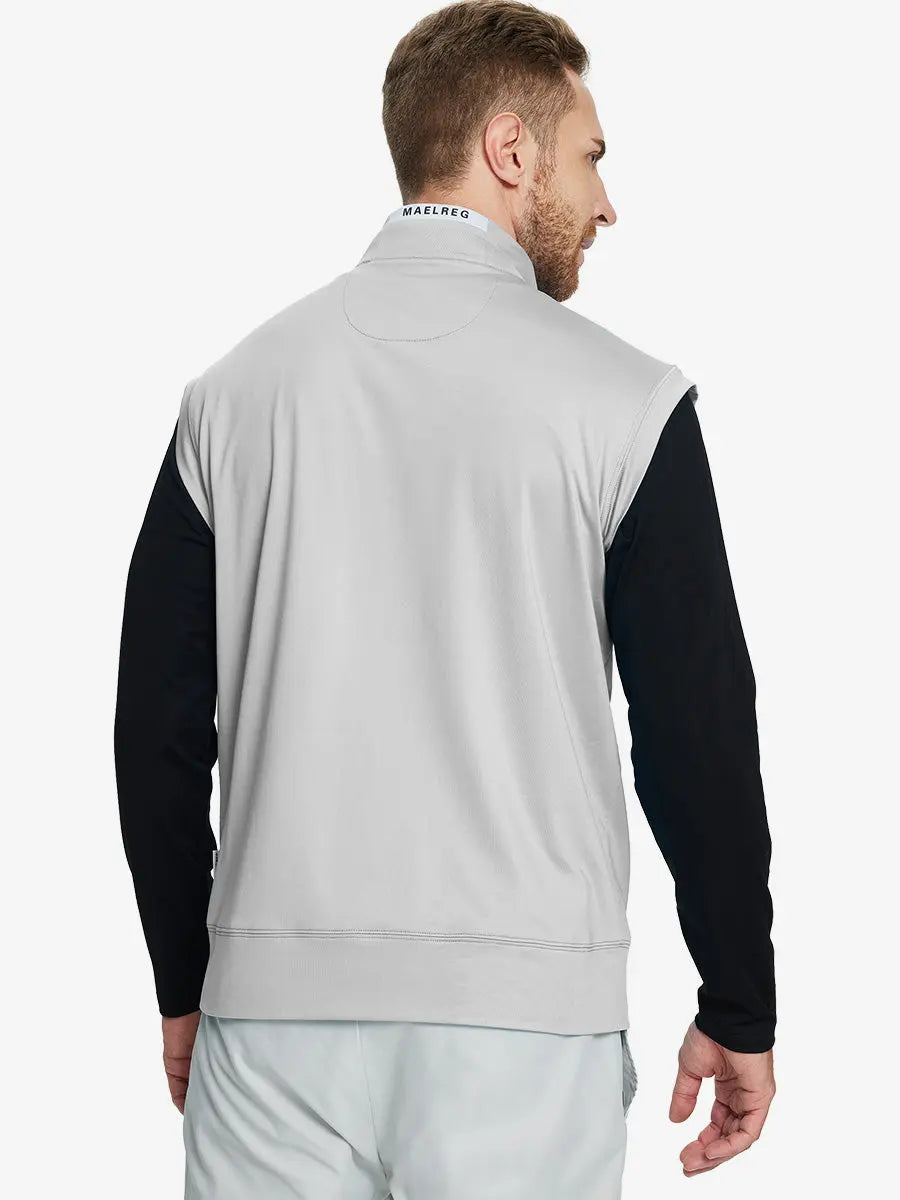 Back half-body view of model in TAUPE Stretch Solid Fleece Quarter-Zip Vest.								
