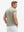 Back waist-up shot of model wearing kakhi flower breathable jacquard pattern 3-button golf polo